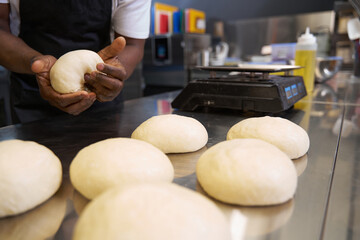 Male preparing ingredients for baking at the kitchen