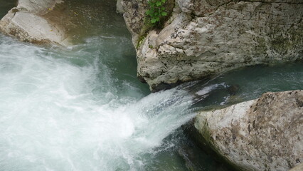 the flow of water between the stones