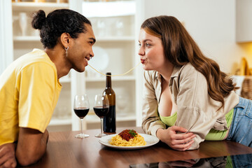 modern multiethnic unstereotyped couple lifestyle moments at home. Not stereotyped boyfriend and girlfriend living together. True love concepts