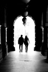 Silhouettes of people walking in the city