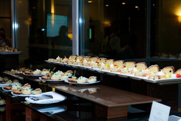Desserts during a buffet table close up