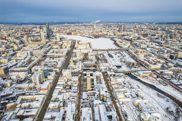 Fototapeta premium Yekaterinburg aerial panoramic view at Winter in cloudy day. Ekaterinburg is the fourth largest city in Russia located in the Eurasian continent on the border of Europe and Asia.