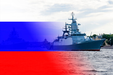 The Russian Navy. Military exercises at sea, a ship on the background of the Russian flag