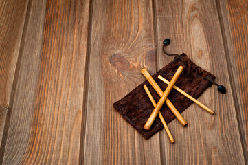 Four bamboo sticks to massage the face and other parts of the body.