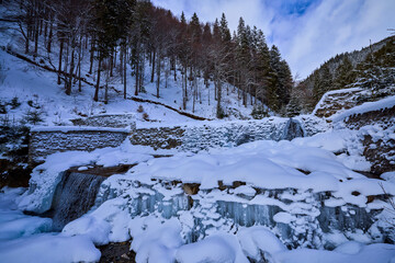 winter images with a mountain river. idyllic landscape