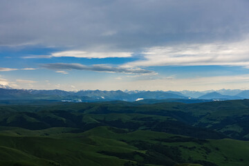 View of Elbrus and the Bermamyt plateau in the Karachay-Cherkess Republic, Russia. The Caucasus Mountains.