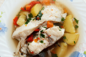 Traditional fish soup served hot in a plate
