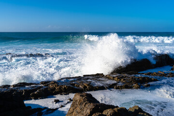 Waves Crashing on Rocks