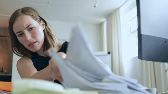 Video of a busy and stressed professional business woman sitting at office table having a deadline soon, working as hard as possible to be recognized for the hard work. Concept: near sick note