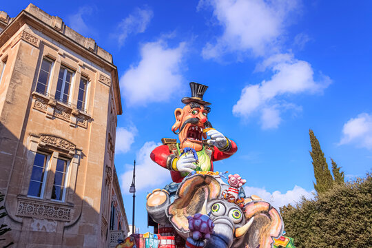 Putignano, Apulia, Italy - February 15, 2015: carnival floats, giant paper mache. Allegorical float of Ilva industry: death at work.