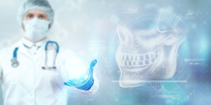 Medical poster, human skull anatomy, jaw x-ray, teeth snapshot. The doctor looks at the x-ray hologram of the jaw. Dentist, orthodontist, toothache, bite.