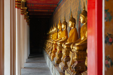 Row of Golden Buddha in Thailand. Golden Buddha statues at Temple of the Emerald Buddha, Wat Phra Kaew.