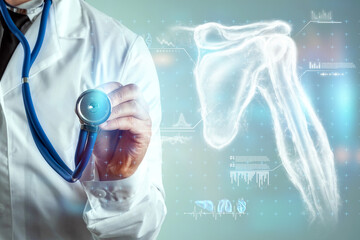 Medical poster, human body anatomy, shoulder joint x-ray, bones hologram. The doctor looks at the...