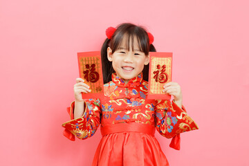 Chinese girl with traditional dressing up and holding a 