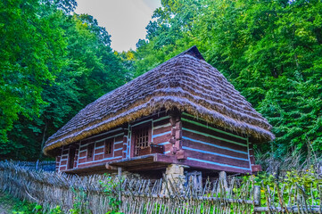 Fototapeta na wymiar Wooden hut in the forest, sanok, Poland