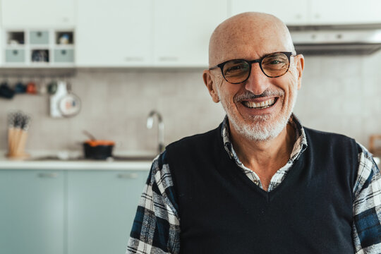 Portrait of a middle aged man looking into the camera - copy space on the left.