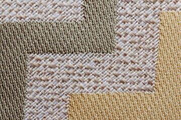 texture of jacquard fabric with geometric pattern close-up