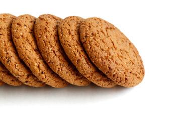 Oatmeal cookies are isolated on a white background.