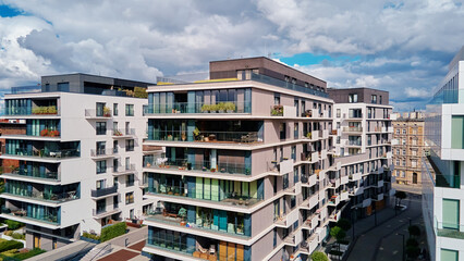Modern residential complex. Facade of new house block in Europe. Complex of apartment residential buildings