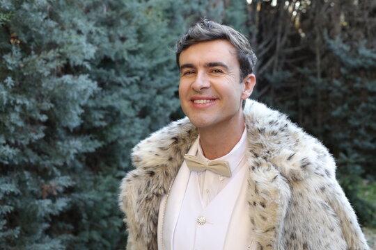 Luxurious looking man wearing spotted fur waistcoat