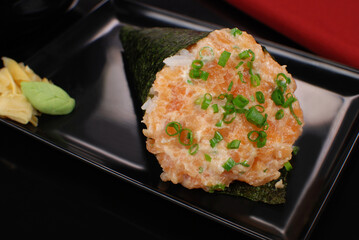 Salmon fish Temaki in black background
