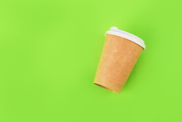 coffee cup of reusable materials on green background. zero waste concept. replacement for plastic cups