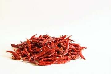 Fototapeta premium Dried red chili peppers. stock photo isolate on white front view copy space 