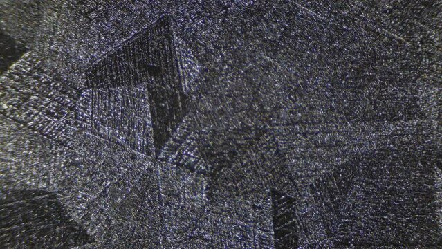 Galvanized metal surface with zinc for corrosion protection. Crystallized surface of galvanized iron sheet. Microstructure of zinc coating for the automotive industry. Multiple magnification 