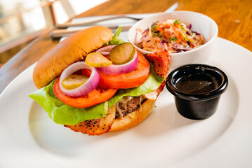 burger with salad and sauce