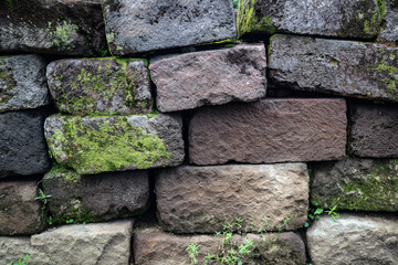 Pile of old grunge stone brick background