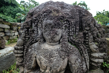 Stone statue in the courtyard of the ancient Surowono temple, Pare, Kediri, Indonesia