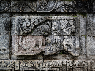 Reliefs on the walls of the ancient Surowono temple, Pare, Kediri, Indonesia