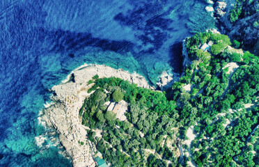 Face like shape in Amalfi coast from Punta Campanella near Sorrento. Amazing aerial view from drone in summer season.
