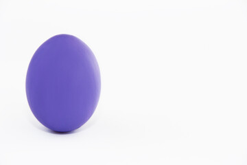 easter egg of violet color very peri on a white background