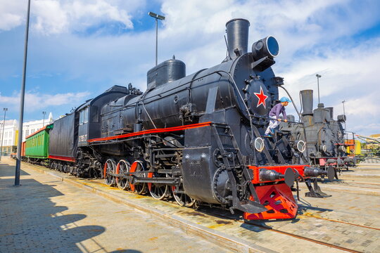 Russia, Verkhnyaya Pyshma, July 2021: Steam locomotives of the Ov and Eu series at the site of the Military Glory Museum of the Urals.