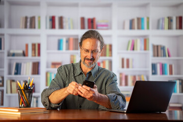 Fototapeta premium Successful man with phone very excited with success.