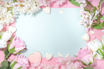 Obraz na płótnie Canvas Pink and white spring holiday background with various cute tender flowers. Valentine day, international women's day 8 march, birthday, mother's day greeting card mockup top view flatlay frame