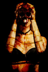 Woman holding bloody skull against dark background - obrazy, fototapety, plakaty