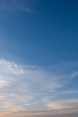 Dark blue sky with cirrus white clouds. Good for replacing sky.