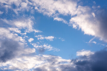 Fototapeta na wymiar Light blue sky with beautiful clouds. Replacement texture.