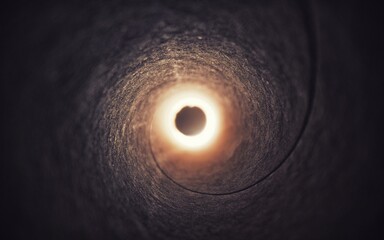 Spiral tunnel with light at the end