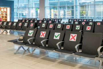 Quarantine limitations in the airport departure gate.