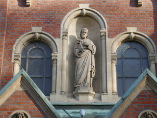 Statue of a saint at St. Johannes Baptist parish church, Neheim, Arnsberg-Neheim, Sauerland, North Rhine-Westphalia, Germany, commonly known as "Sauerland cathedral"