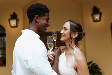 Couple celebrating their anniversary with sparkling wine