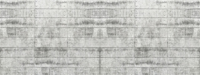 Panoramic grey and white cement wall with rough texture. Destroyed surface. Grunge background best for wallpaper.	