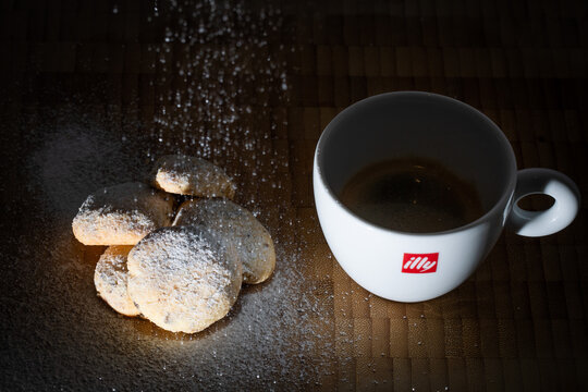 Cup of Illy coffee with home made cookies
