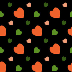 Seamless pattern with green and orange hearts on black background. Vector image.