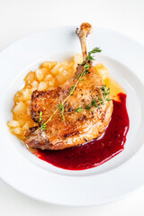  Duck confit with cranberry sauce