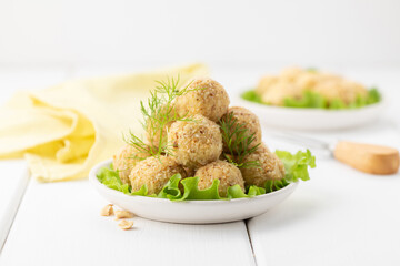 Cheese balls. Portioned appetizer of grated cheese with nuts.