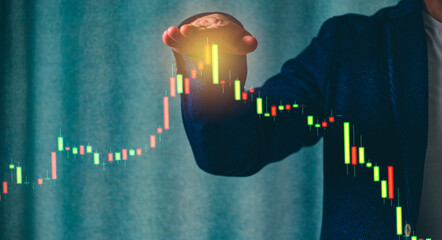 a successful investor, trader, manipulates the direction of the price of stocks, securities, the concept of investment and management, a close-up of the trader's hands